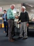 Harvey King, Chairman of the SIPST Organising Committee accepts the SC Cricket Personality of the Year Cup from Life Member Noel Dellow on behald of committee.
