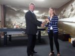 Jess Bailey accepts the Women's Bowler of the Year Trophy from David Fisher