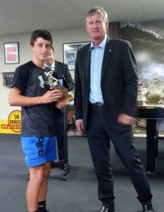Caleb Donaldson with trophy for best under 15 player