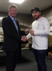 Josh Smallridge receives the Lowrie Trophy for sportsmanship
