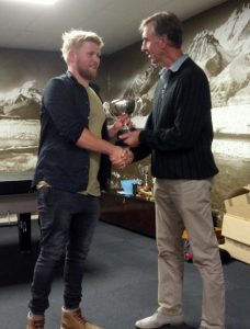 Glen Drake receives Tweedy Cup on behalf of Temuka from Life Member Chris Galwey
