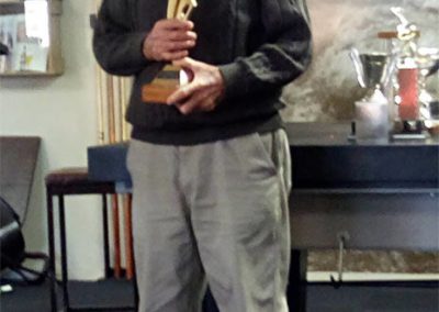 Noel Dellow presenting the administrator of the Year trophy at South Canterbury Prizegiving